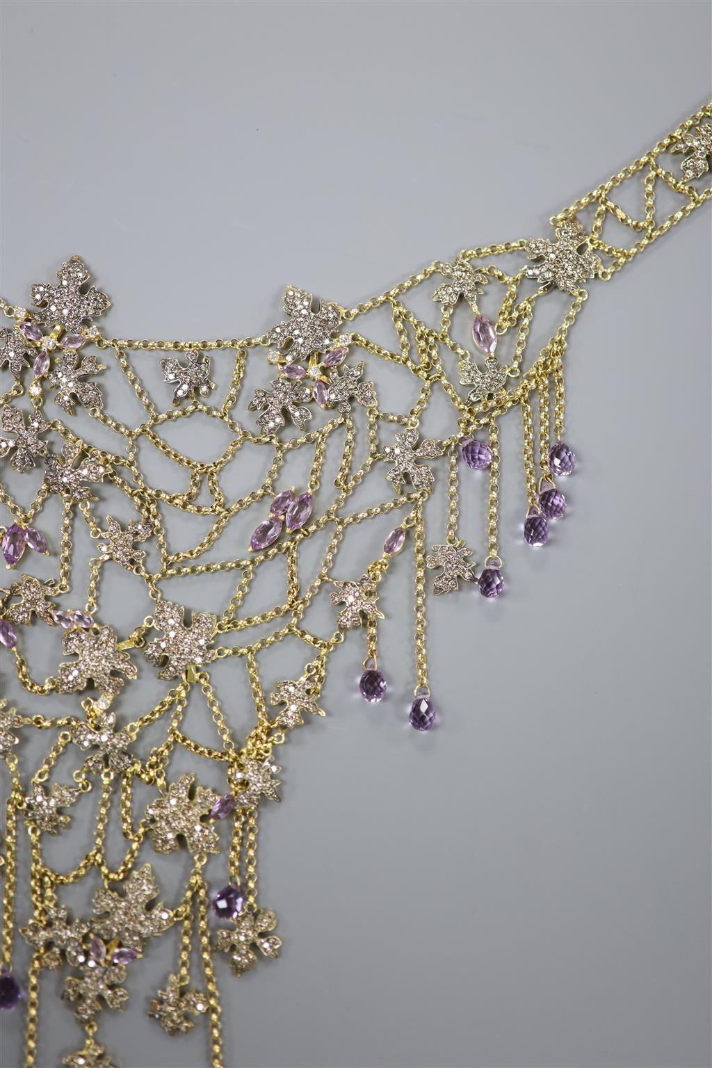 A 20th century yellow metal, amethyst and diamond chip set drop fringe necklace,